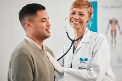 smiling doctor and patient during urgent care visit